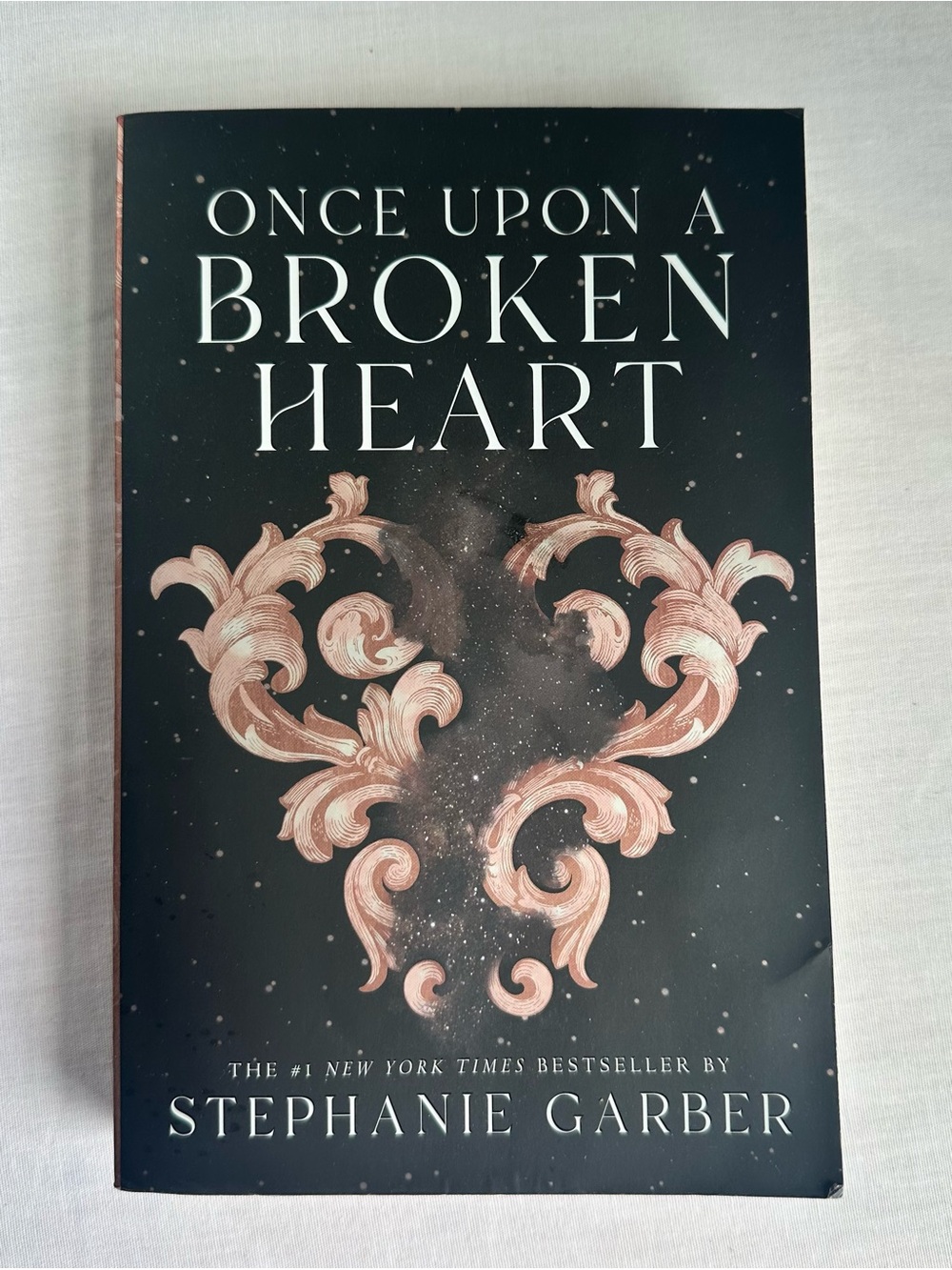 Once Upon a Broken Heart by Stephanie Garber - Black Cover with Rose Gold Design